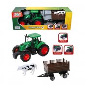 Grøn traktor med anhænger og en sød ko